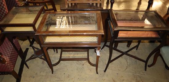 Three early 20th century display tables, largest 57cm